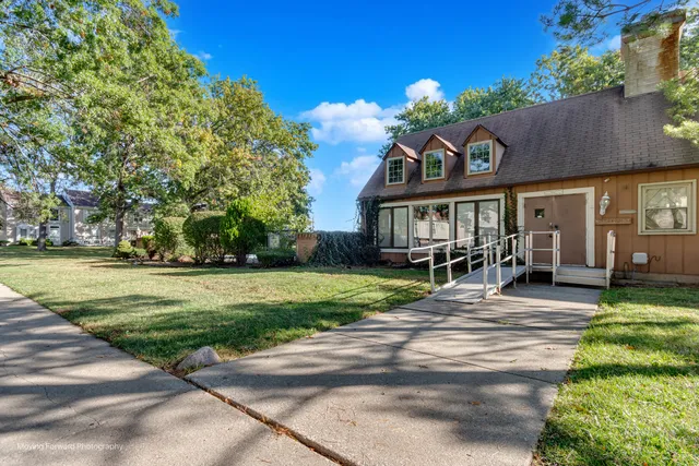 a house view with a garden space