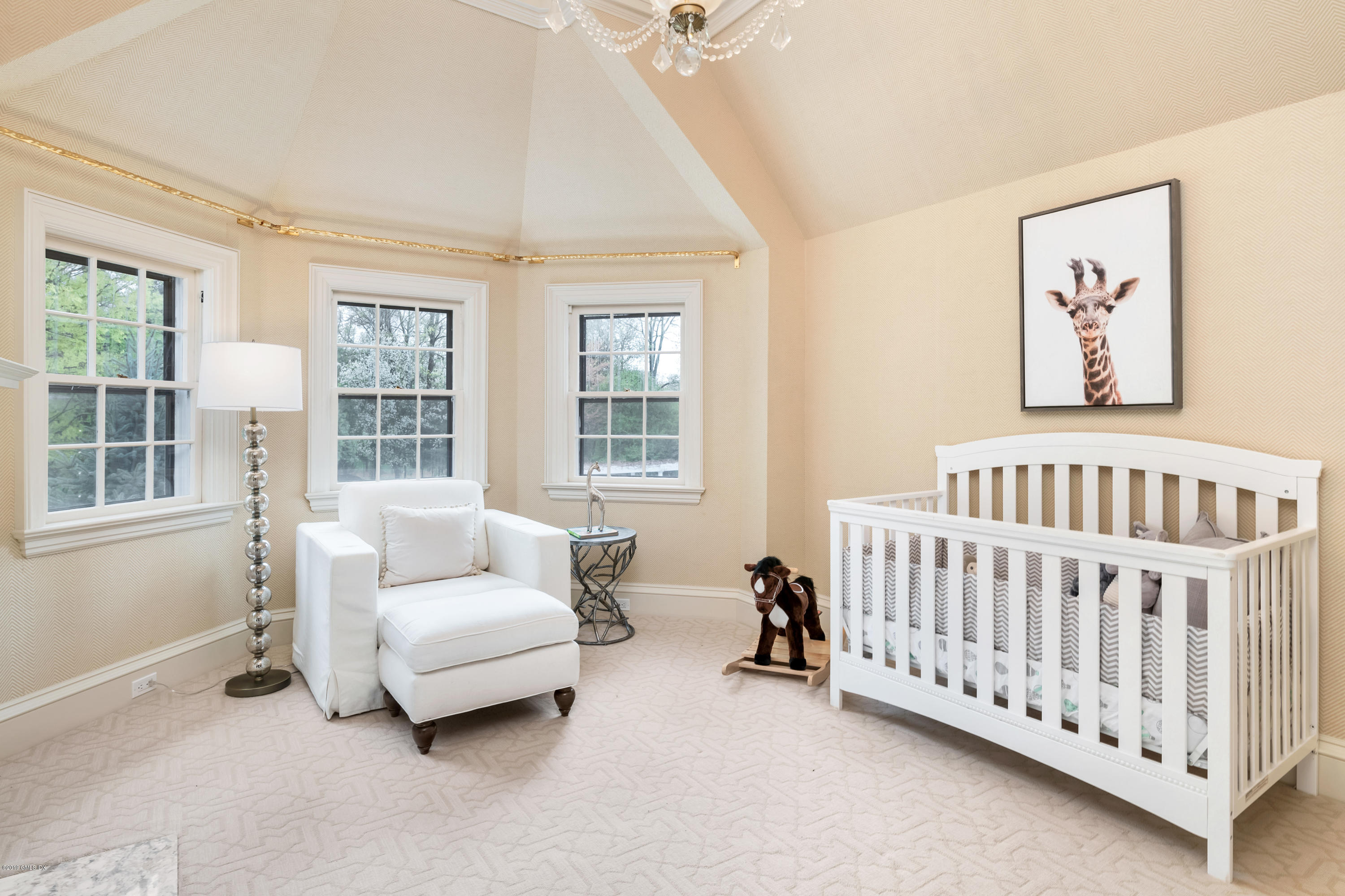 8 Juniper Hill Road Greenwich, CT 06830 - Photo 23 of 27 a living room with furniture and windows