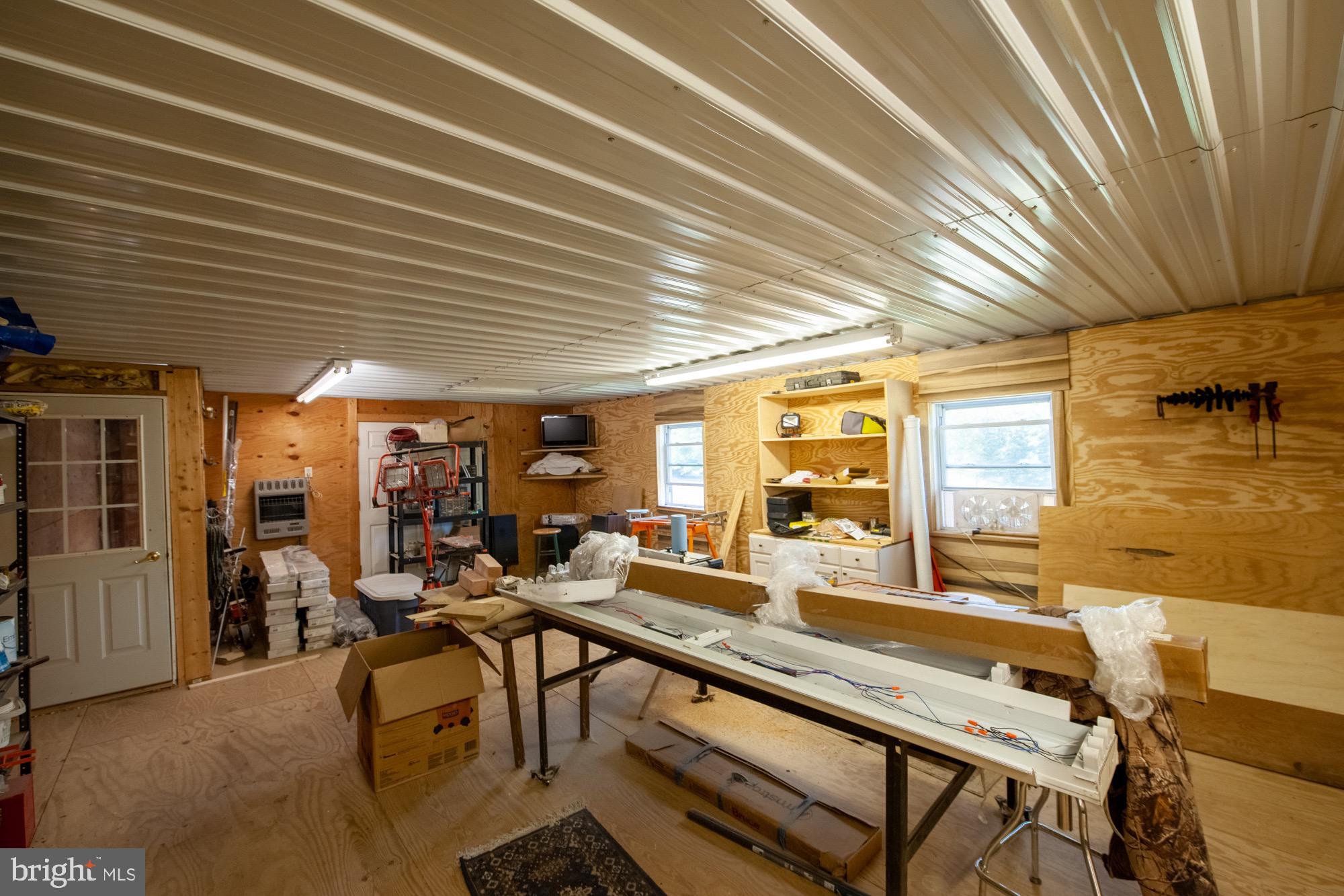 404 Lankford Road Harwood, MD 20776 - Photo 45 of 79 workshop above equipment storage bay