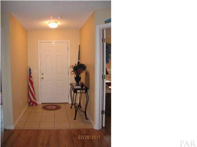 6911 Cedar Ridge Circle Milton, FL 32570 - Photo 4 of 11 5' wide, tiled foyer/entry way.
