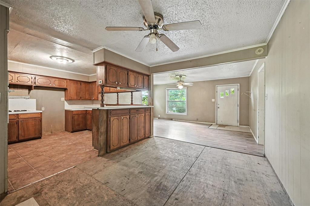 414 South Broadway Street Bells, TX 75414 - Photo 29 of 29 a view of a kitchen with a sink and cabinets