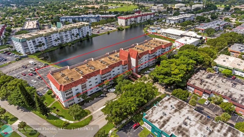 4750 Northwest 22nd Court, Unit 417 Lauderhill, FL 33313 - Photo 22 of 24 a view of a city and a lake view