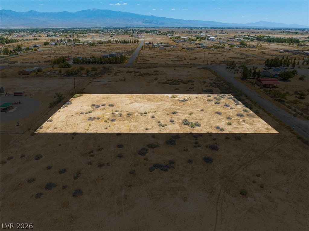 4580 Lawrence Road Pahrump, NV 89048 - Photo 27 of 40 A spacious, buildable parcel with unobstructed mountain views, perfect for a dream home.