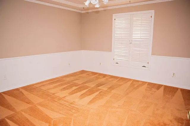 a view of a room with a window