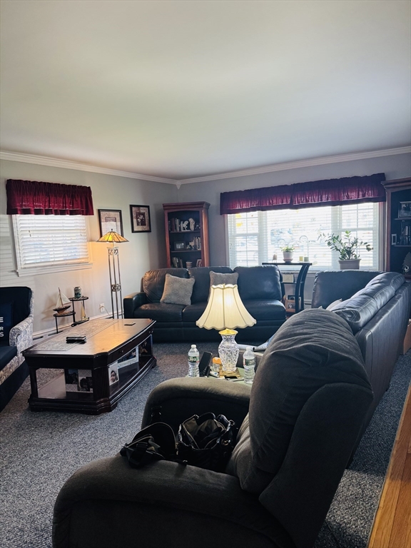 649 Stafford Road Fall River, MA 02721 - Photo 4 of 17 a living room with furniture and a large window