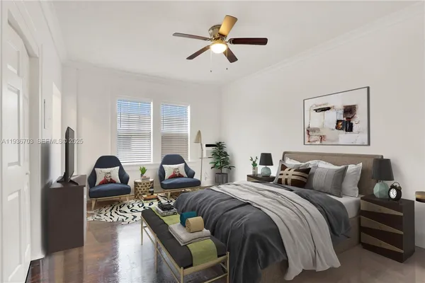 a view of empty room with wooden floor and window