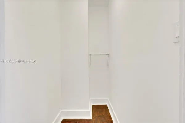 a bathroom with a sink mirror bathtub and toilet