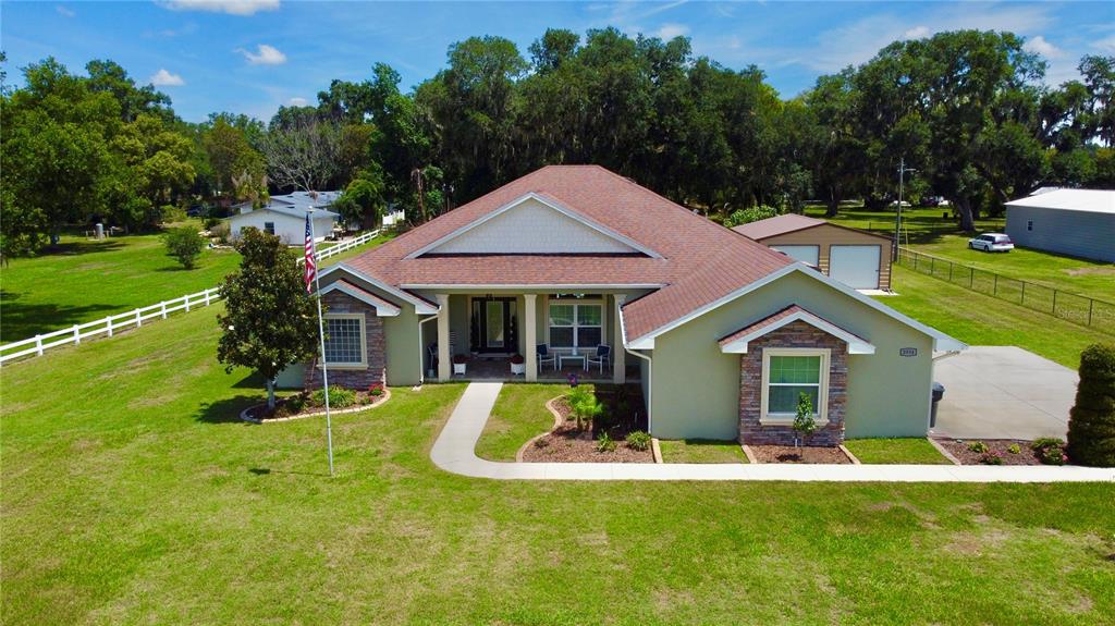 3934 Connersville Road Bartow, FL 33830 - Photo 81 of 81 a view of a house with swimming pool and a yard