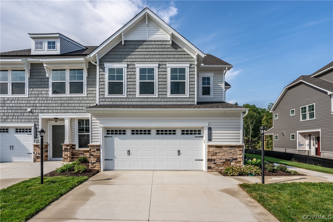 18637 Palisades Ridge Moseley, VA 23120 - Photo 2 of 41 a front view of a house with garden