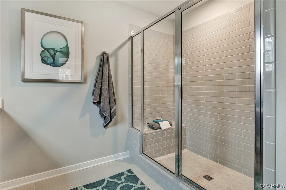 18637 Palisades Ridge Moseley, VA 23120 - Photo 22 of 41 a bathroom with a shower and a window