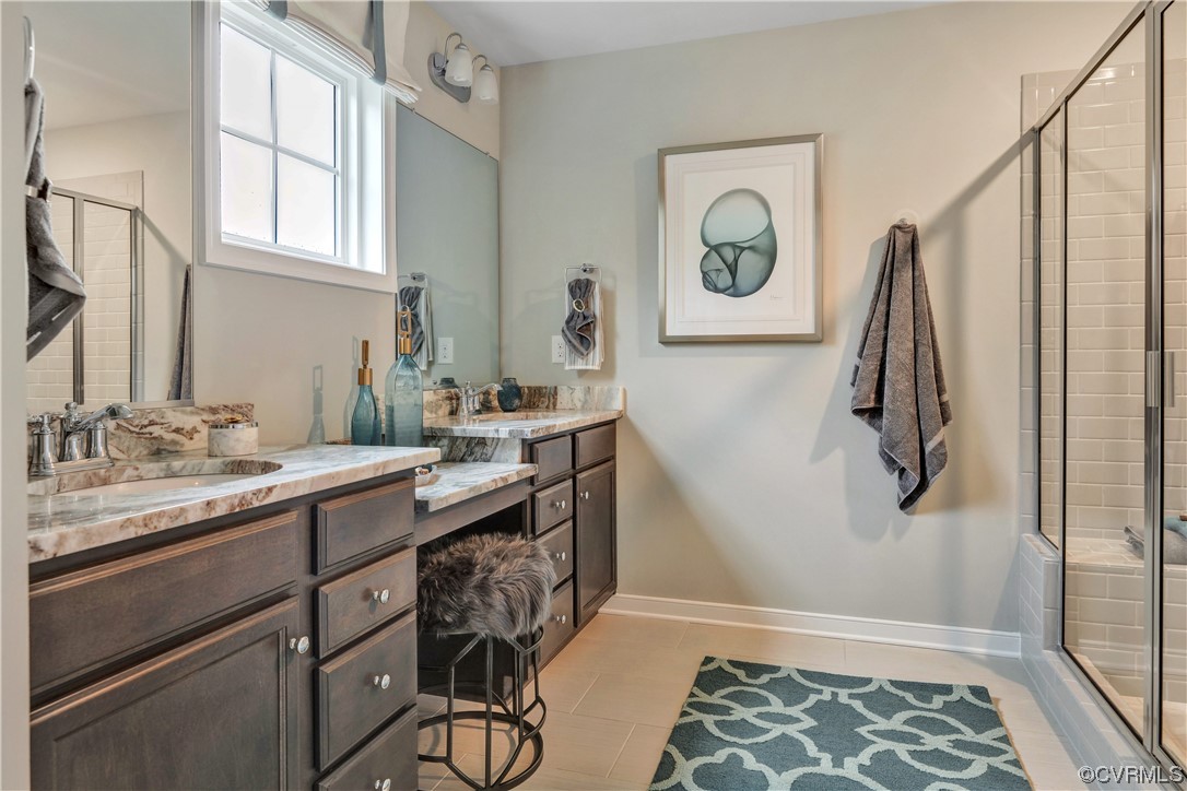 18637 Palisades Ridge Moseley, VA 23120 - Photo 23 of 41 a bathroom with a sink and a mirror