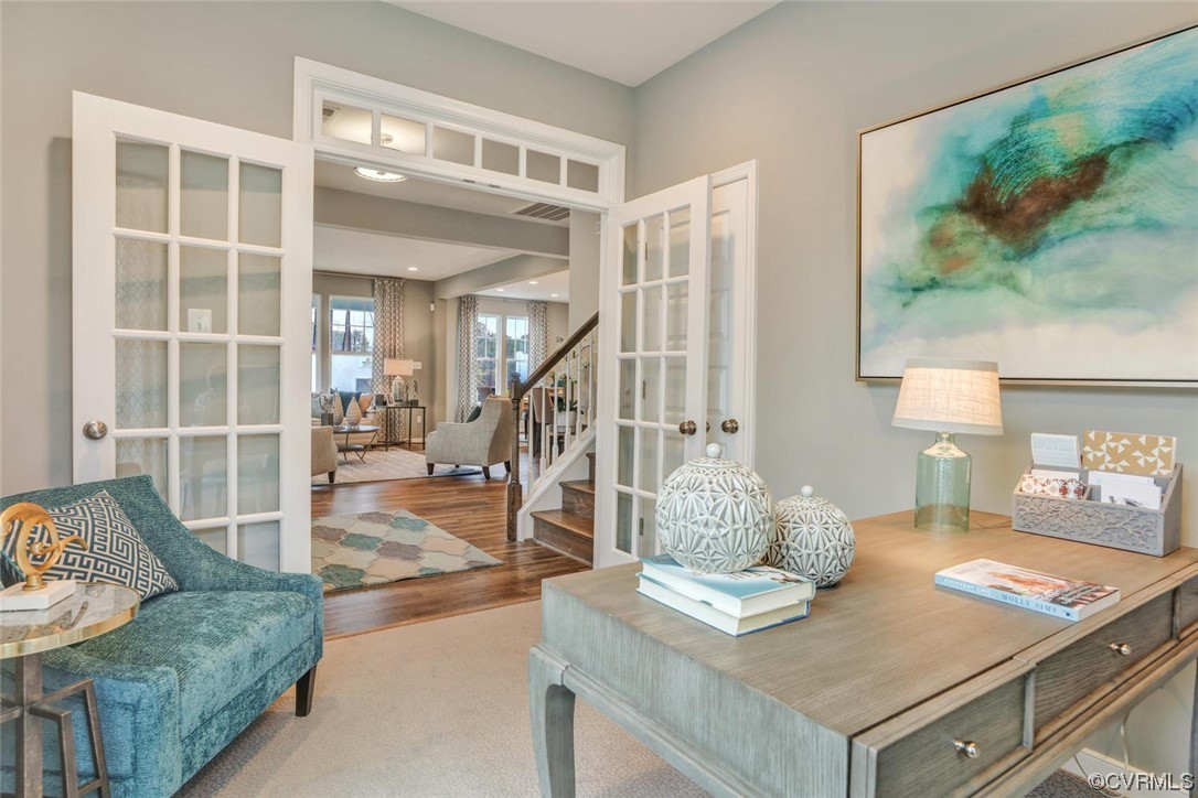 18637 Palisades Ridge Moseley, VA 23120 - Photo 4 of 41 a living room with furniture and a table