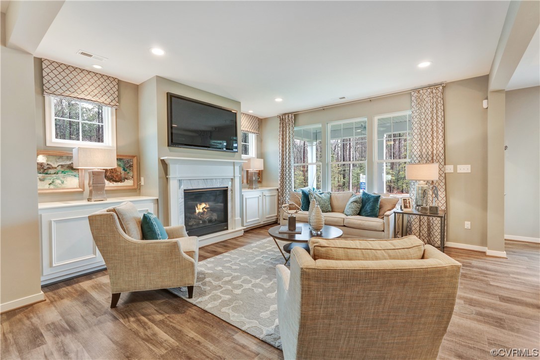 18637 Palisades Ridge Moseley, VA 23120 - Photo 7 of 41 a living room with furniture fireplace and flat screen tv