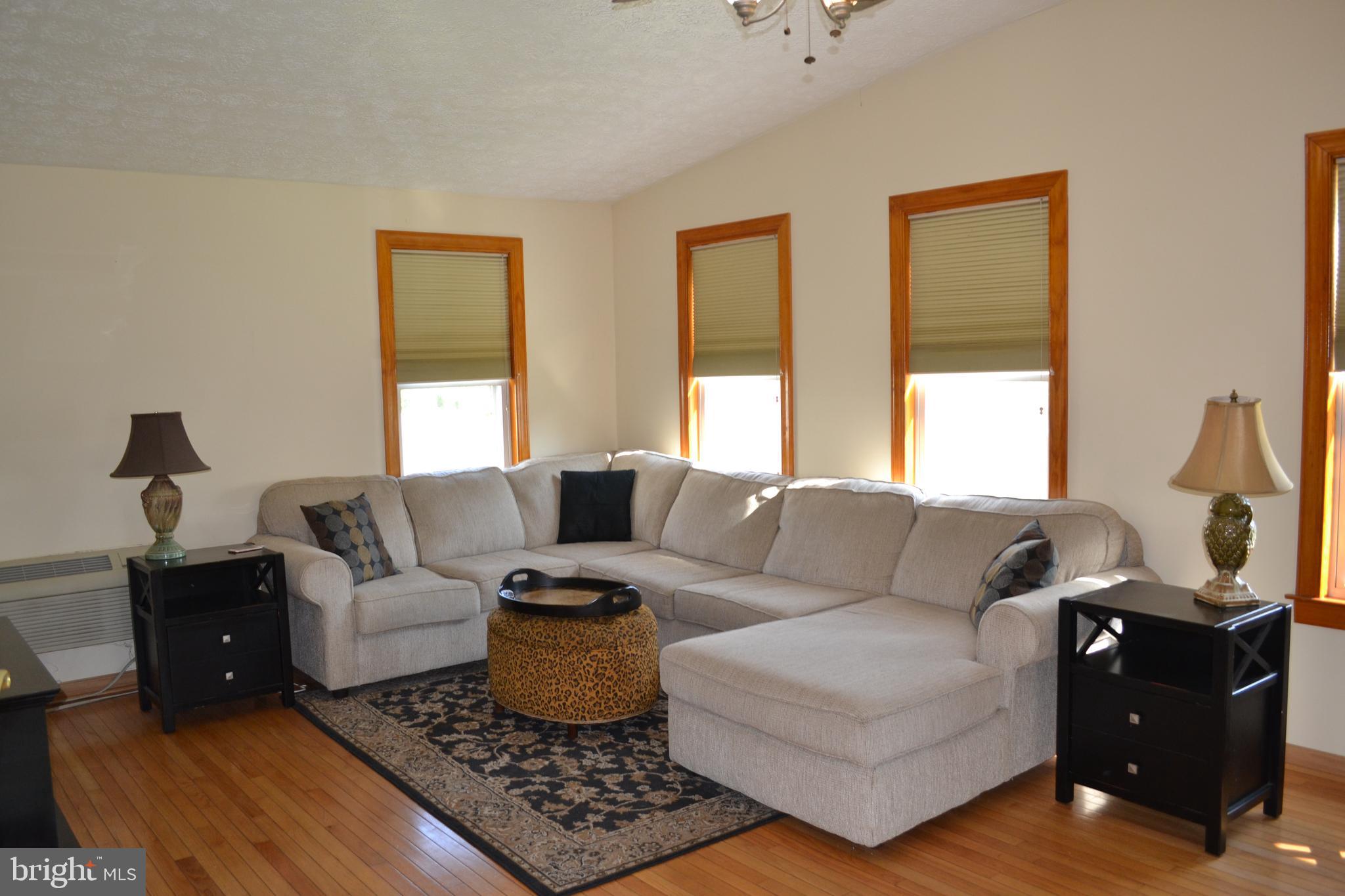8811 Ridgelys Choice Drive Baltimore, MD 21236 - Photo 6 of 36 Beautiful Bonus Room with Vaulted Ceilings