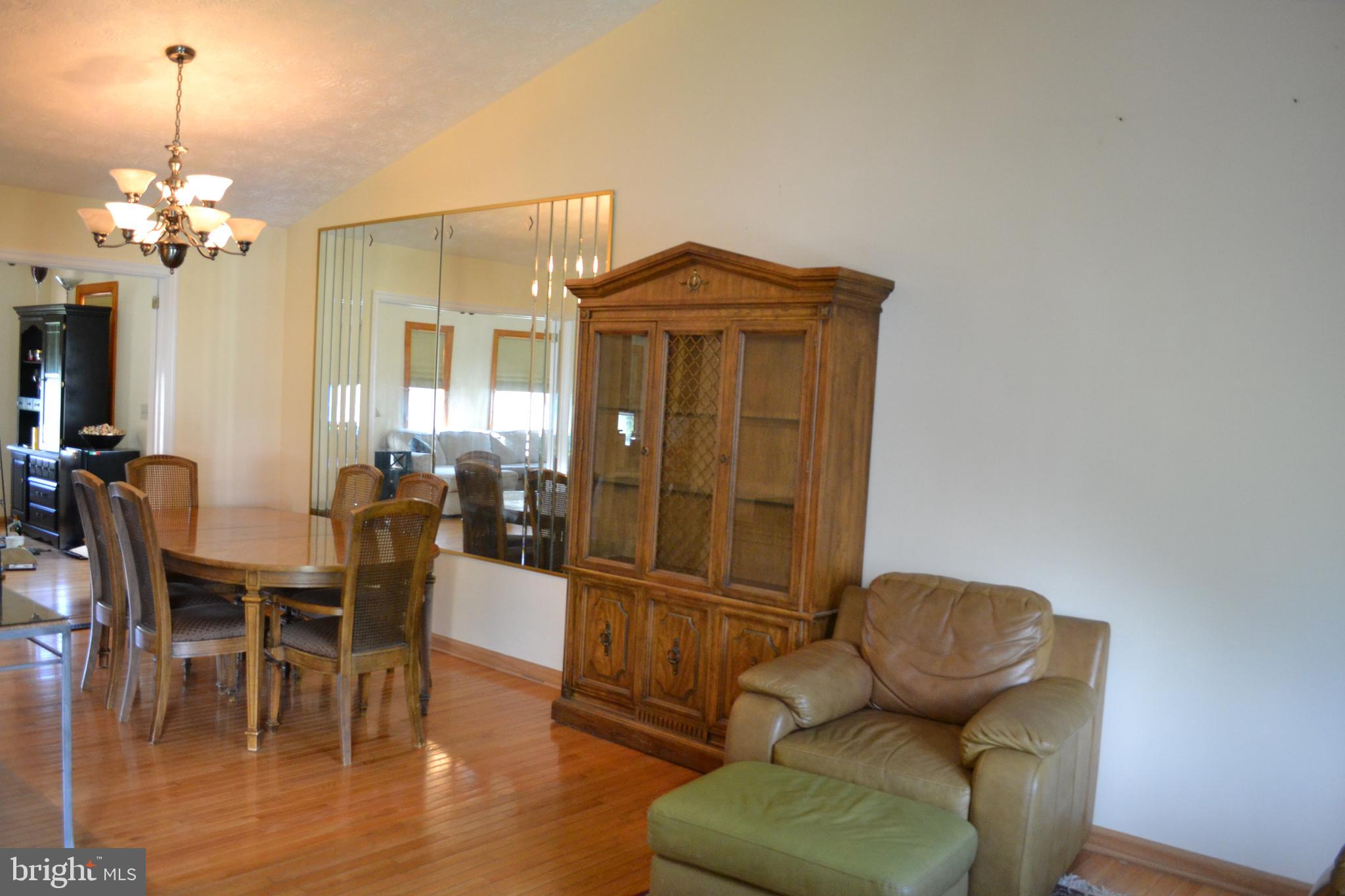 8811 Ridgelys Choice Drive Baltimore, MD 21236 - Photo 8 of 36 Dining Room with Glass French Doors to Bonus Room