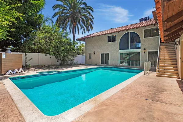 a view of outdoor space yard and swimming pool