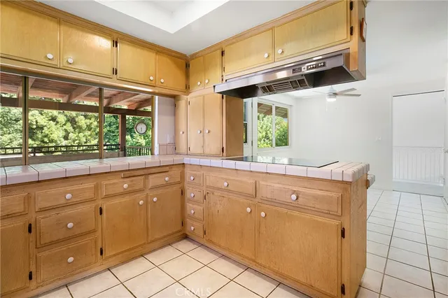 a bathroom with a sink a mirror and a shower