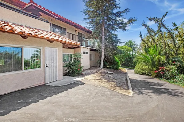 a view of a building with a yard