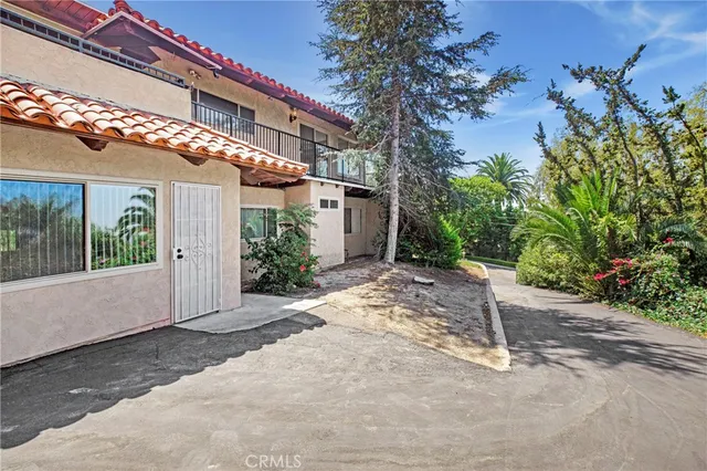 a view of a building with a yard