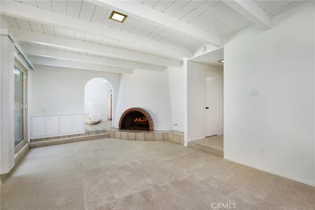 a view of a room with a large window