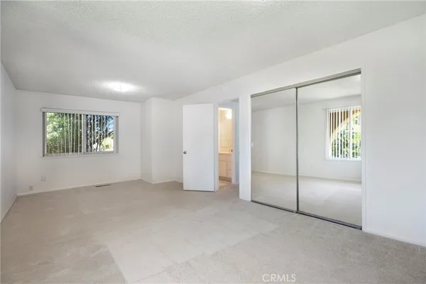 a view of entryway with washer and dryer