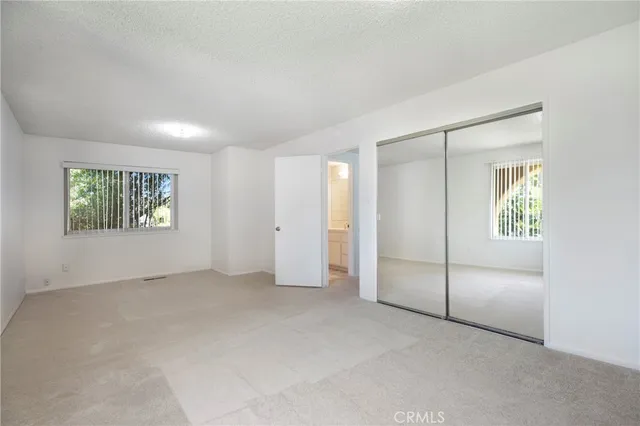 a view of entryway with washer and dryer