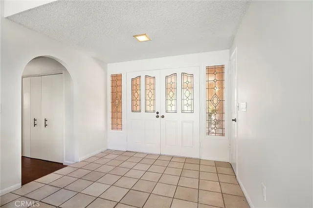 a view of a room that has a large window