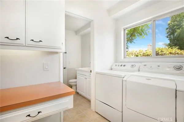 a bathroom with a sink toilet and vanity