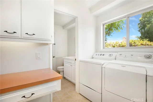 a bathroom with a sink toilet and vanity