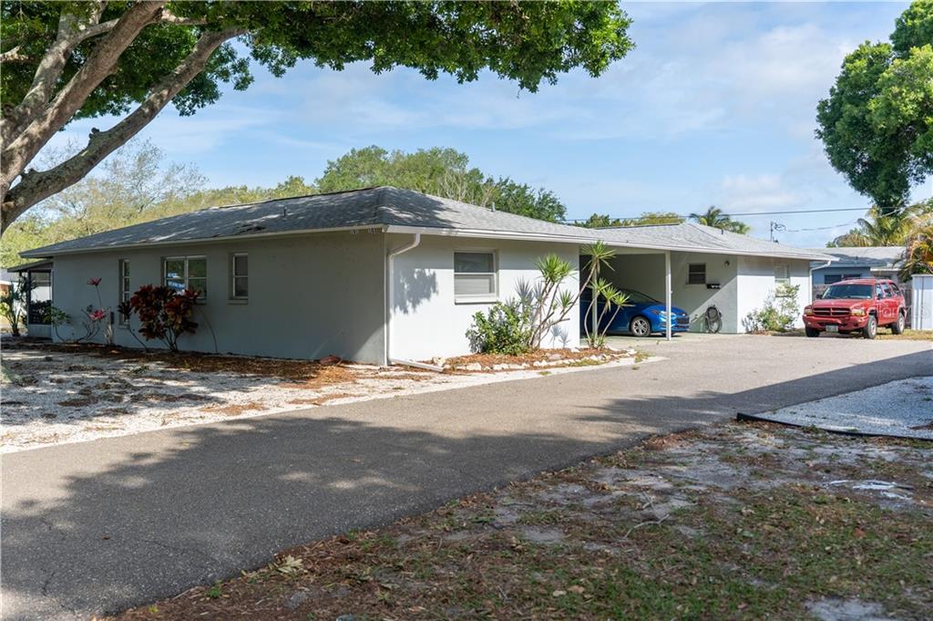 101 Base Avenue West Venice, FL 34285 - Photo 1 of 1 a front view of a house with a yard and garage