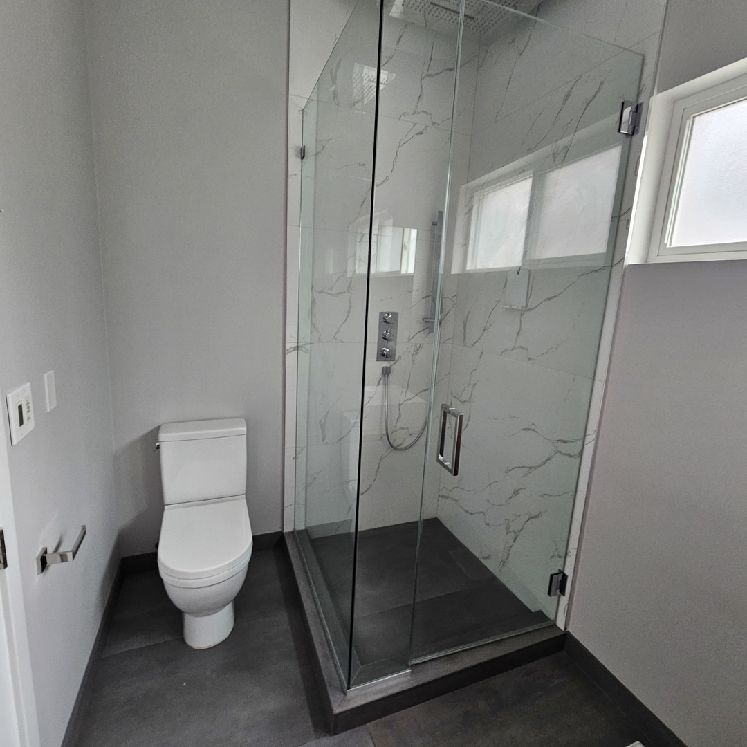 1013 North Honore Street, Unit 1 Chicago, IL 60622 - Photo 15 of 17 a bathroom with a granite countertop toilet