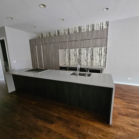 a view of kitchen with furniture and window