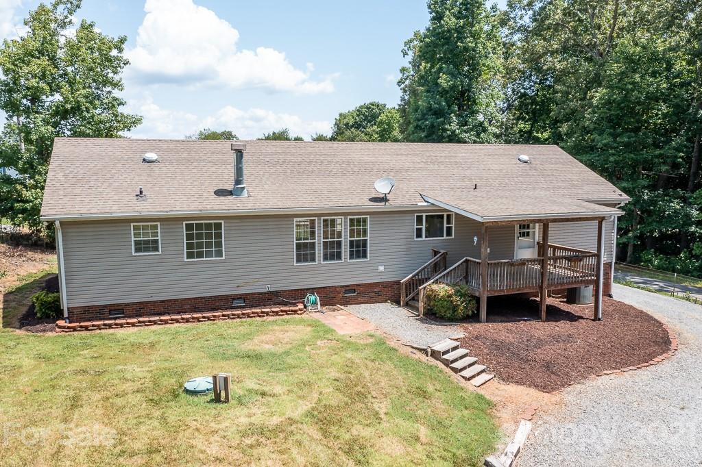 6621 Love Point Road Denver, NC 28037 - Photo 5 of 26 an aerial view of a house with a yard and sitting area