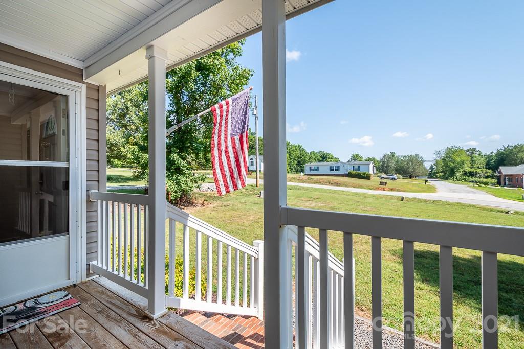 6621 Love Point Road Denver, NC 28037 - Photo 8 of 26 a view of outdoor space with deck and wooden floor