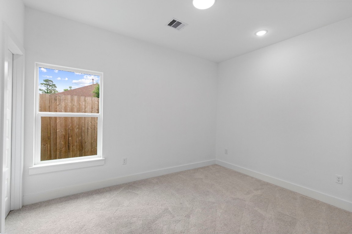 8109 Hamlet Street, Unit B Houston, TX 77078 - Photo 8 of 21 a view of empty room with window