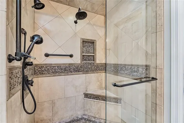 a bathroom with a sink and a shower