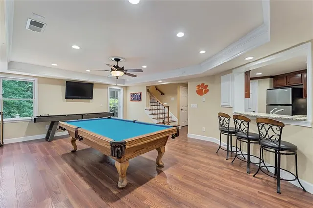 a room with furniture and a large window