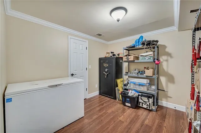 a room with window and wooden floor