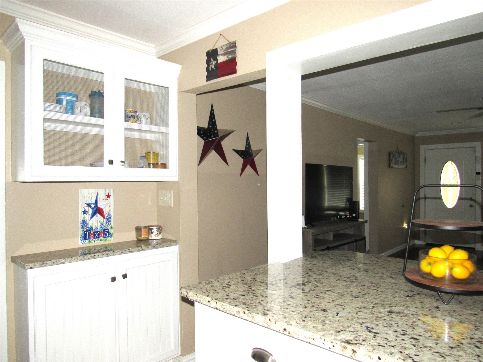 1013 Prairie Lea Street Brenham, TX 77833 - Photo 12 of 36 a view of kitchen island with wooden floor