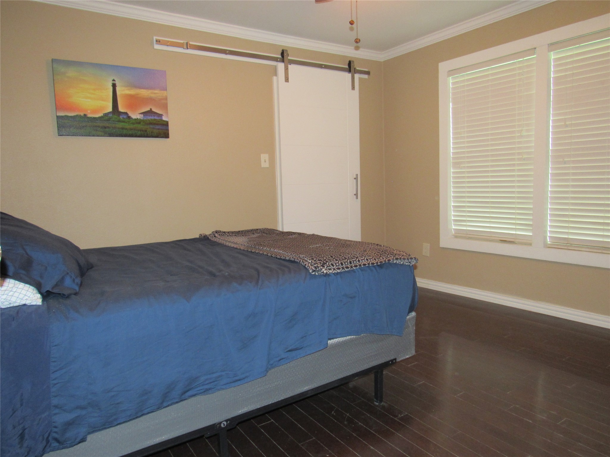 1013 Prairie Lea Street Brenham, TX 77833 - Photo 18 of 36 a bedroom with a bed and a window