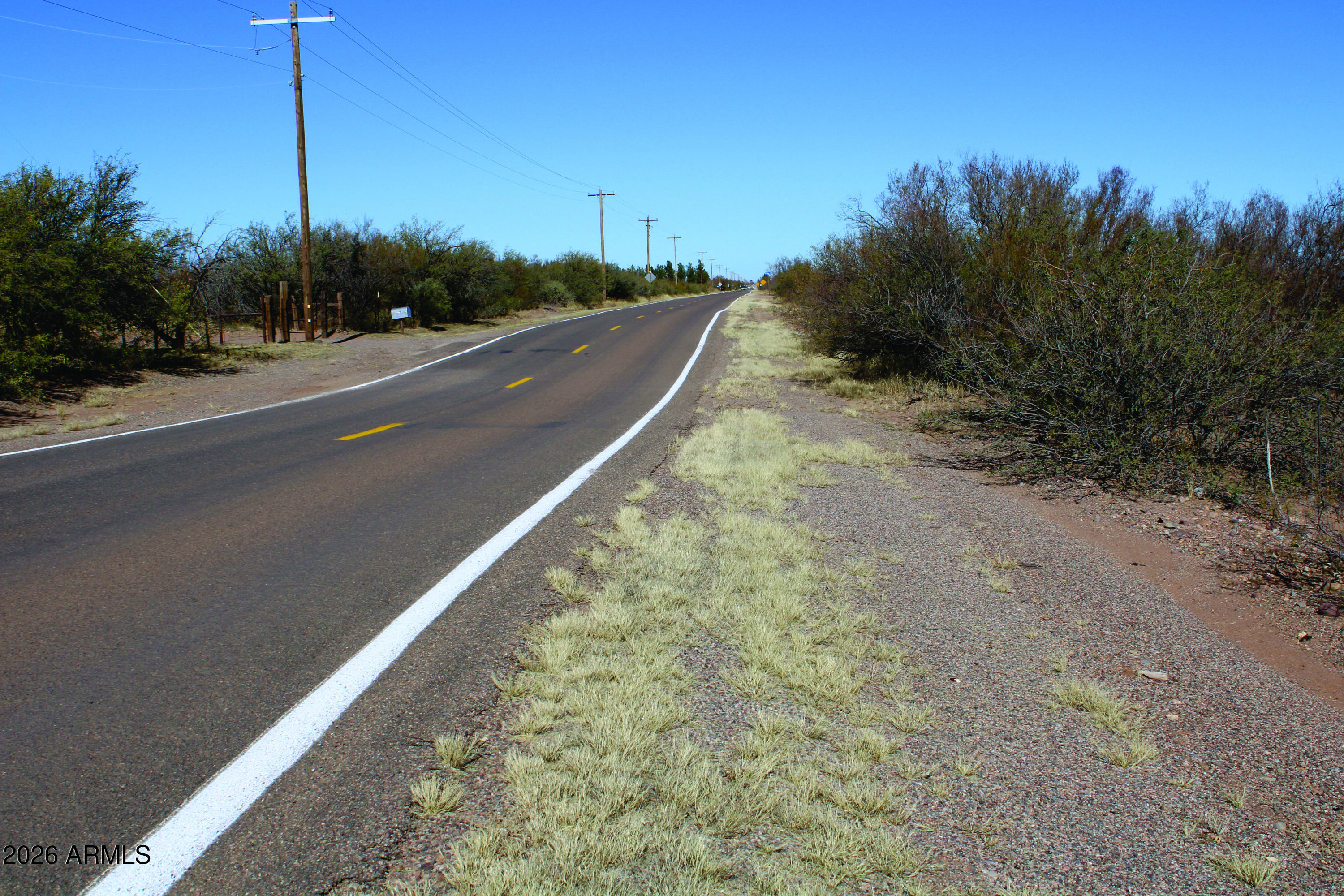 4.49-acres West Duke Road, Unit 2 McNeal, AZ 85617 - Photo 5 of 26 a view of a road with a building in the background