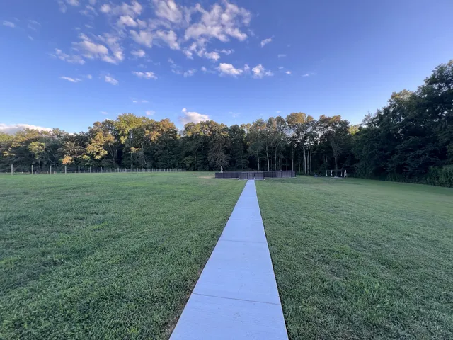 a view of a backyard with a deck