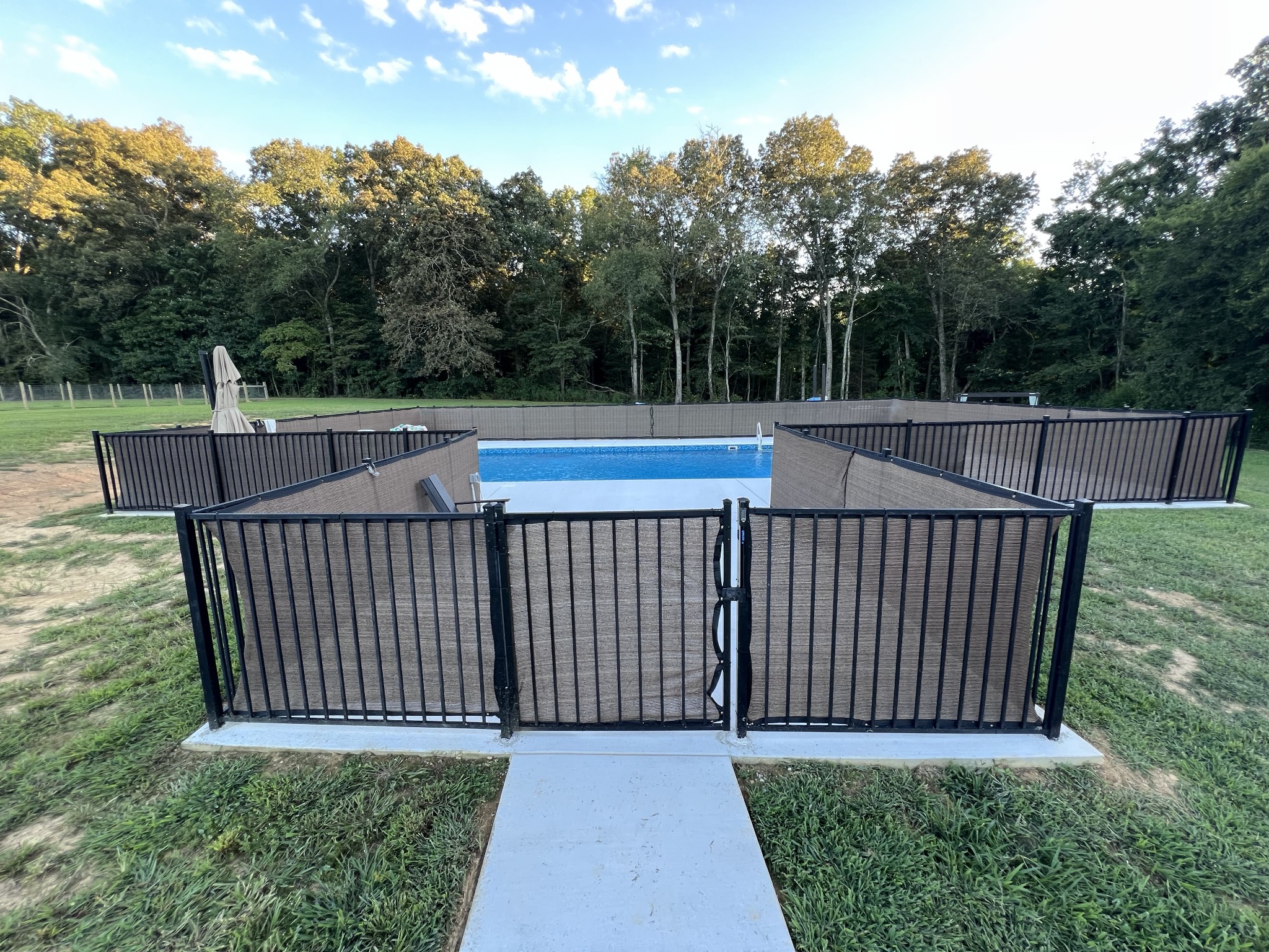 1055 Newt Vanattia Road Hillsboro, TN 37342 - Photo 17 of 52 a view of a backyard with a deck
