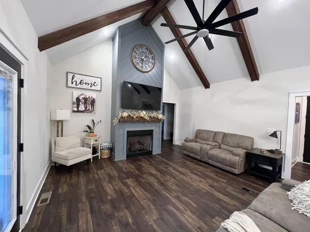 a kitchen with stove and cabinets