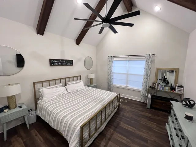 a view of a hallway with the wooden floor