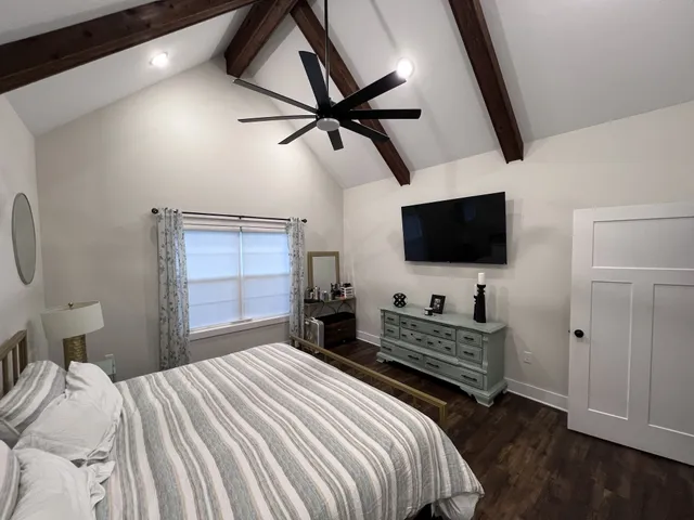 a kitchen with stainless steel appliances a sink and a refrigerator