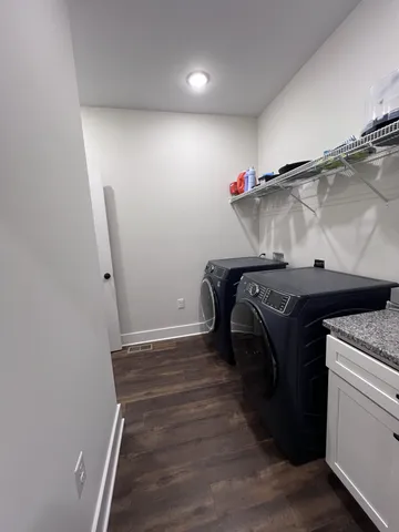 a bed room with a bed and a window