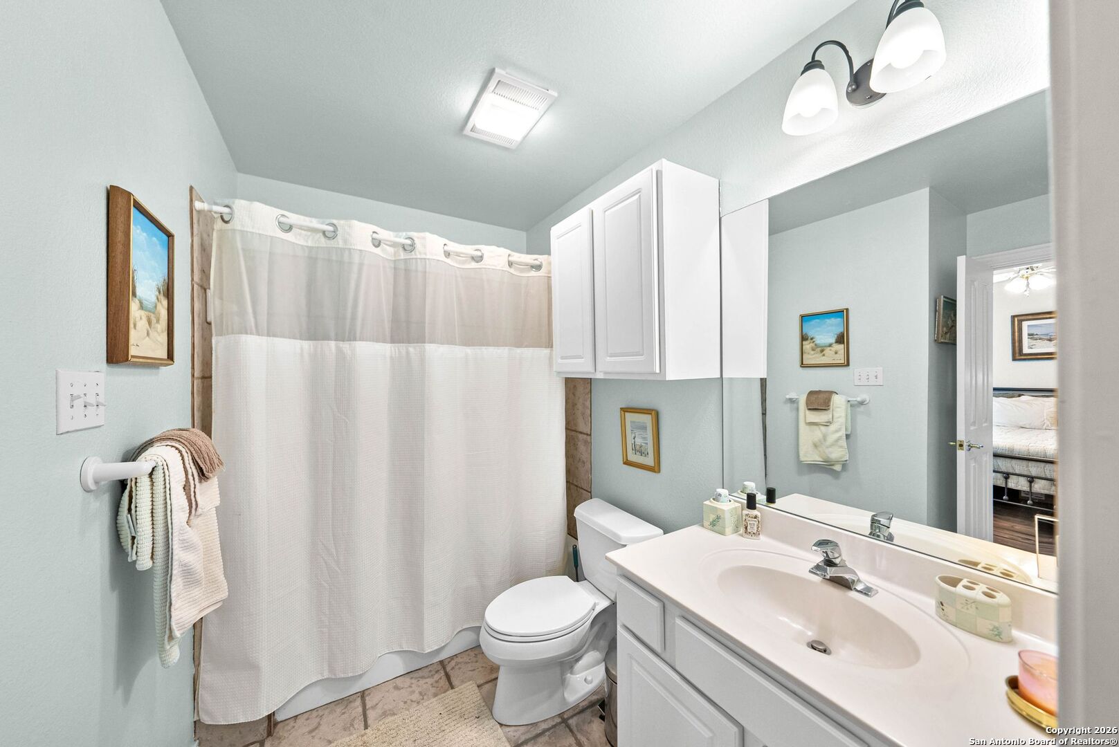 27150 Karsch Road Boerne, TX 78006 - Photo 20 of 79 a bathroom with a sink toilet and shower