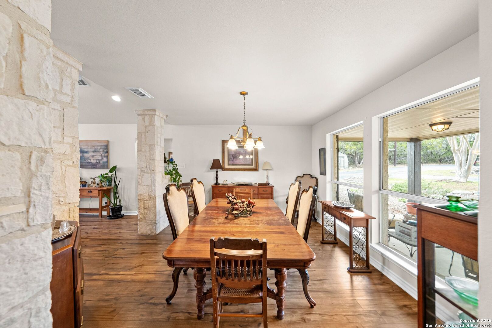 27150 Karsch Road Boerne, TX 78006 - Photo 22 of 79 a view of a dining room with furniture window and wooden floor