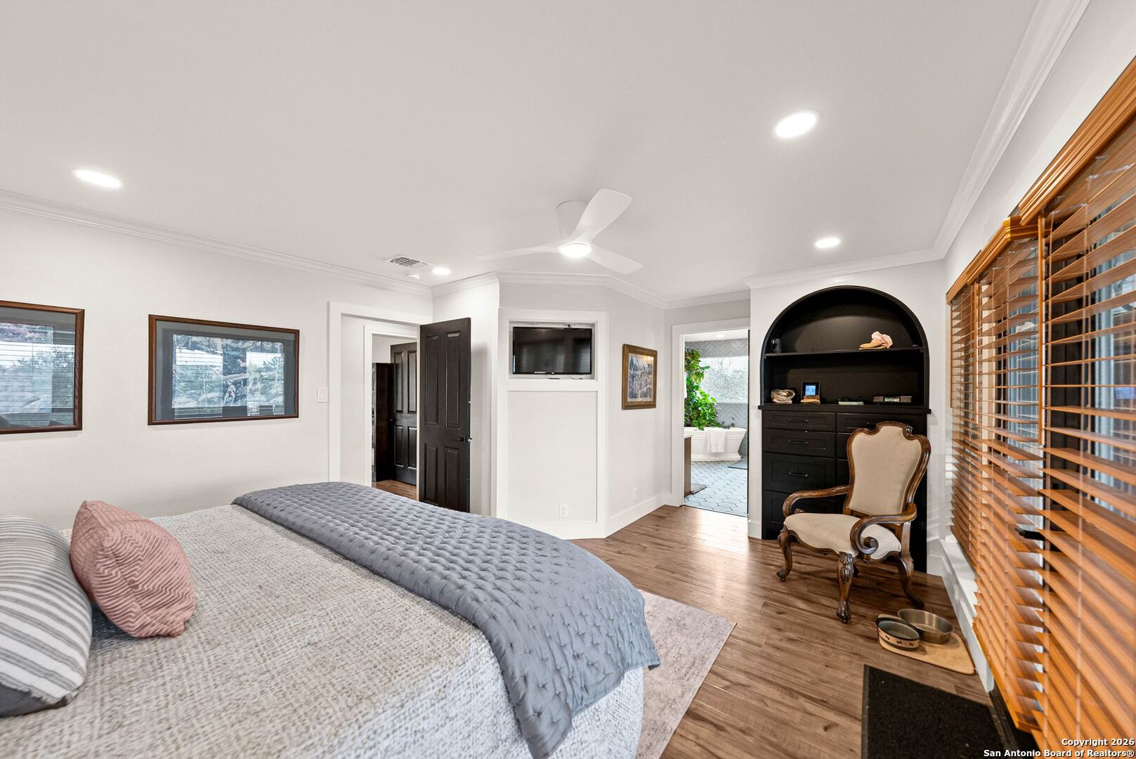 27150 Karsch Road Boerne, TX 78006 - Photo 26 of 79 a bedroom with a bed and wooden floor